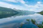 Norway. Storfjorden fjord reflects mountains. Art Print